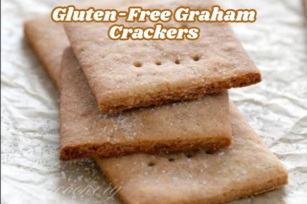 Crunchy, homemade gluten-free graham crackers arranged on a wooden surface.